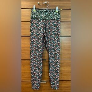 Nike Dri Fit High Waisted 7/8 Leggings, floral print in size small.